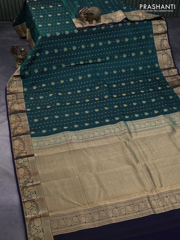 Kanchipuram silk saree peacock green and navy blue with allover zari woven buttas and floral zari woven border