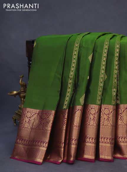 Kanchipuram silk saree green and magenta pink with allover zari weaves & buttas and long zari woven border