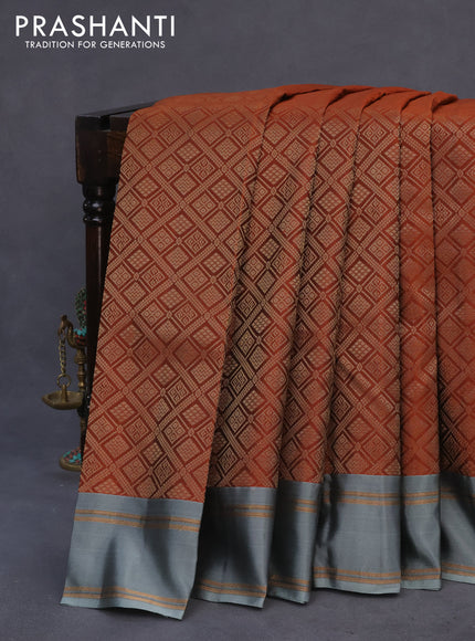 Kanchipuram silk saree rust shade and grey with allover silver zari woven brocade weaves and rettapet zari woven border