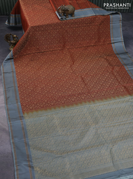 Kanchipuram silk saree rust shade and grey with allover silver zari woven brocade weaves and rettapet zari woven border