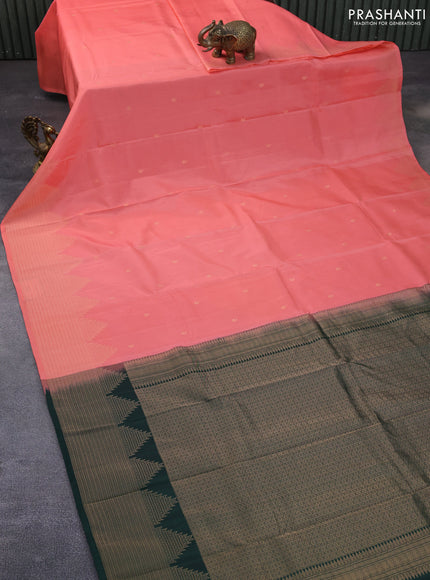 Kanchipuram silk saree peach pink and dark green with paisley zari woven buttas and temple design zari woven border