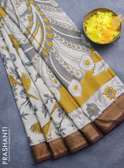 Kalamkari semi silk saree beige mustard shade and maroon with allover prints and mangalgiri border