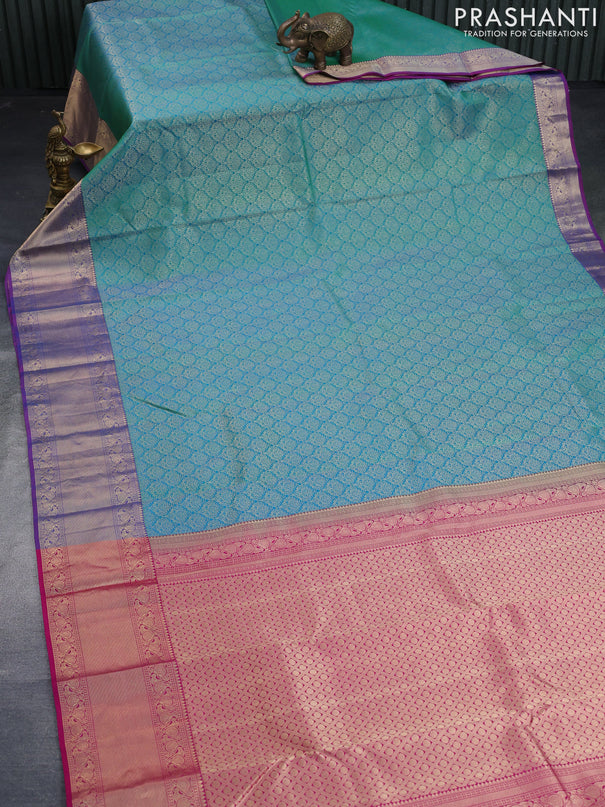 Pure kanchipuram silk saree dual shade of teal bulish green and pink with allover zari woven brocade weaves and zari woven border