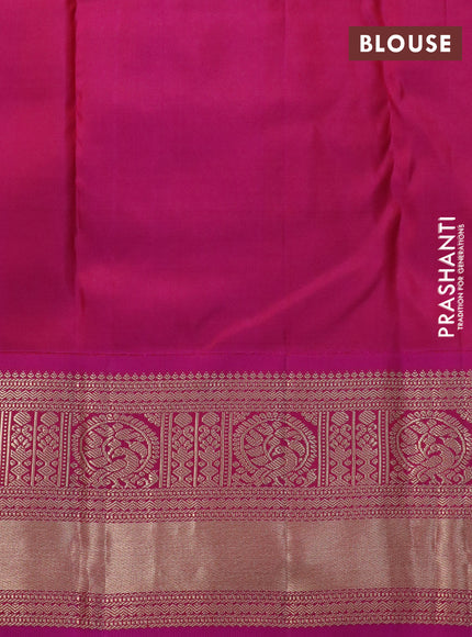 Pure kanchipuram silk saree navy blue and pink with allover zari woven brocade weaves and peacock zari woven korvai border