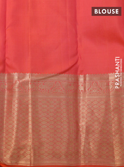 Pure kanchipuram silk saree dual shade of pinkish orange with allover zari woven brocade weaves and long annam zari woven border