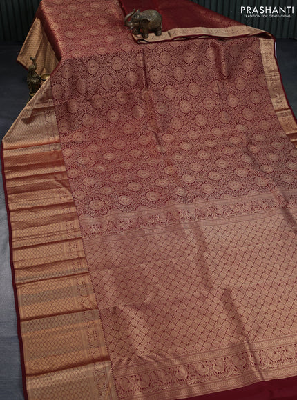 Pure kanchipuram silk saree maroon with allover zari woven brocade weaves and long annam zari woven border