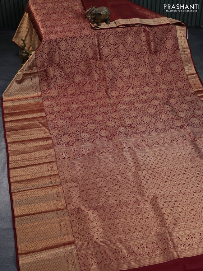 Pure kanchipuram silk saree maroon with allover zari woven brocade weaves and long annam zari woven border