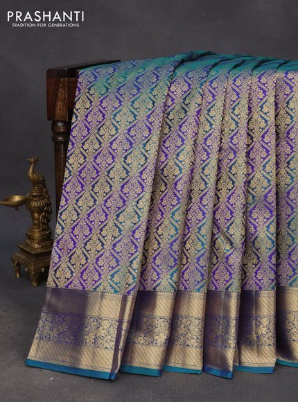 Pure kanchipuram silk saree peacock green and blue with allover zari woven brocade weaves and zari woven floral border