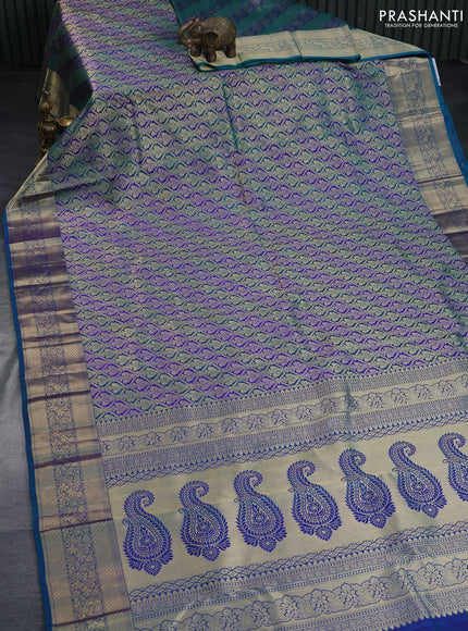 Pure kanchipuram silk saree peacock green and blue with allover zari woven brocade weaves and zari woven floral border