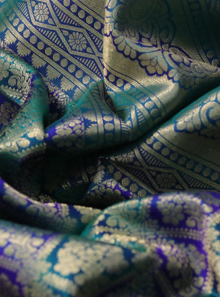 Pure kanchipuram silk saree peacock green and blue with allover zari woven brocade weaves and zari woven floral border