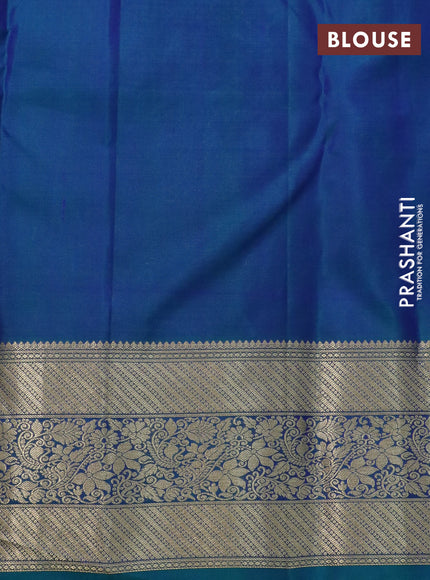 Pure kanchipuram silk saree peacock green and blue with allover zari woven brocade weaves and zari woven floral border