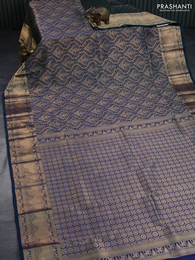 Pure kanchipuram silk saree dual shade of peacock green with allover zari woven brocade weaves and zari woven border