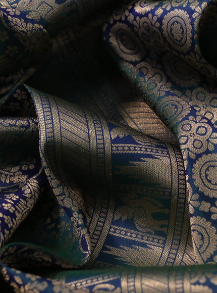 Pure kanchipuram silk saree dual shade of peacock green with allover zari woven brocade weaves and zari woven border