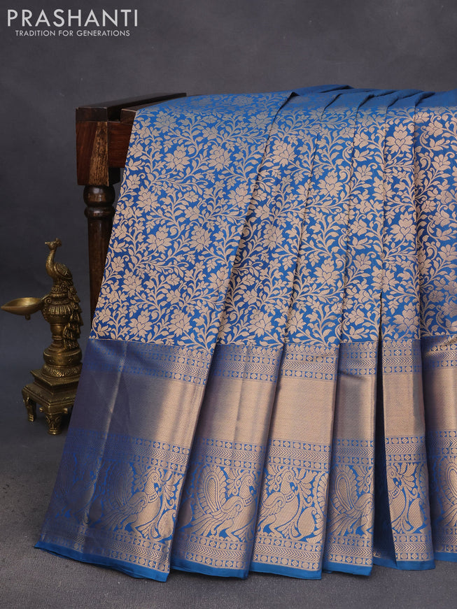 Pure kanchipuram silk saree peacock blue with allover zari woven brocade weaves and long zari woven annam border