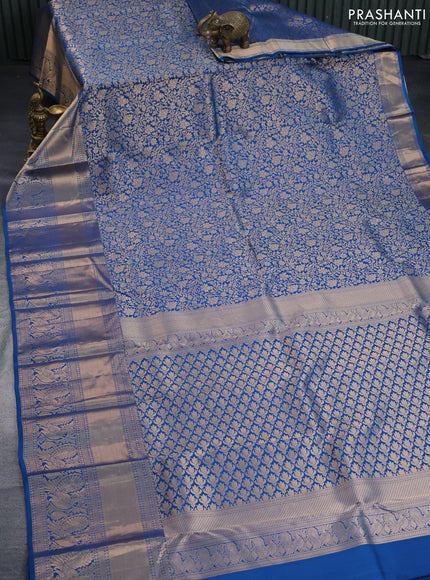 Pure kanchipuram silk saree peacock blue with allover zari woven brocade weaves and long zari woven annam border