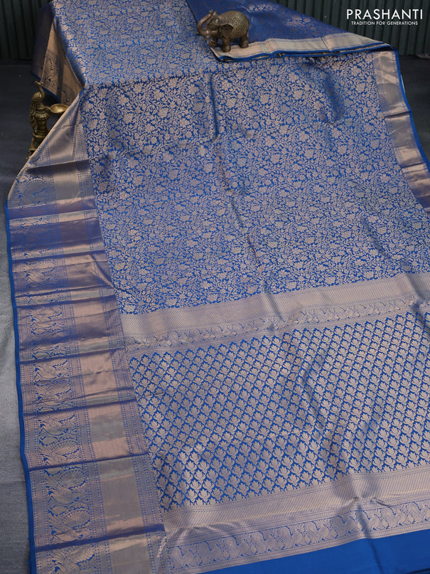 Pure kanchipuram silk saree peacock blue with allover zari woven brocade weaves and long zari woven annam border