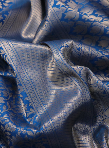 Pure kanchipuram silk saree peacock blue with allover zari woven brocade weaves and long zari woven annam border