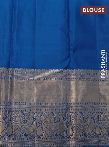 Pure kanchipuram silk saree peacock blue with allover zari woven brocade weaves and long zari woven annam border