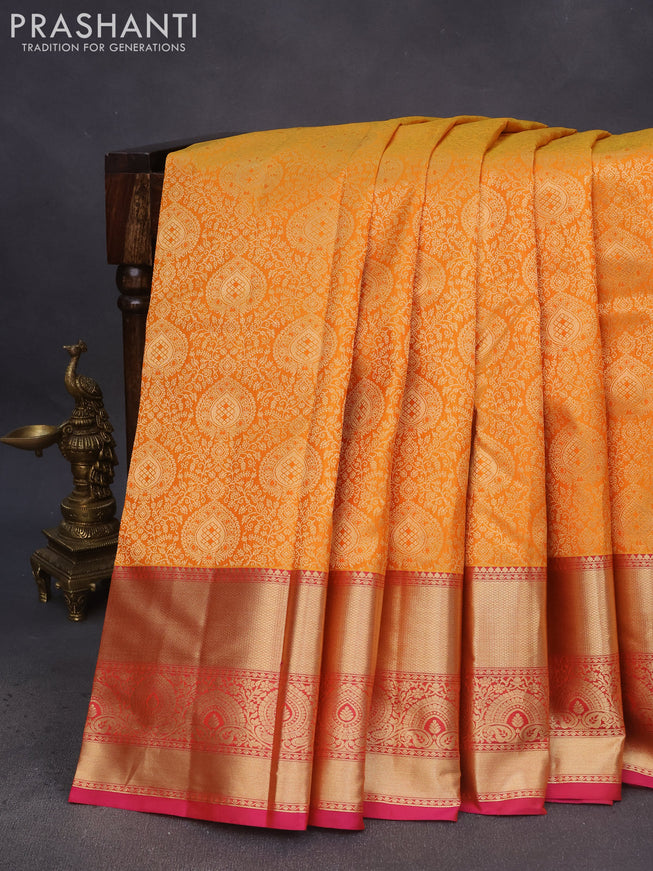 Pure kanchipuram silk saree mango yellow and pink with allover zari woven brocade weaves and long zari woven border