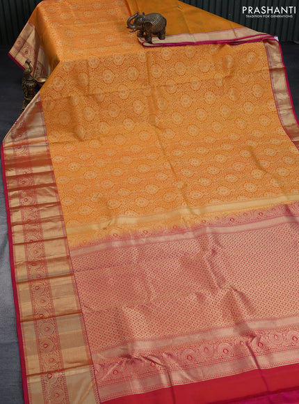 Pure kanchipuram silk saree mango yellow and pink with allover zari woven brocade weaves and long zari woven border