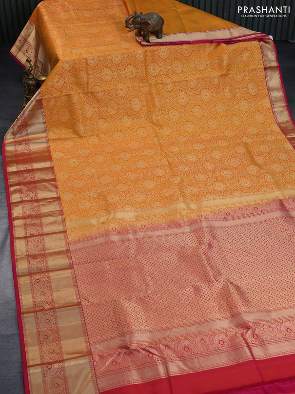 Pure kanchipuram silk saree mango yellow and pink with allover zari woven brocade weaves and long zari woven border