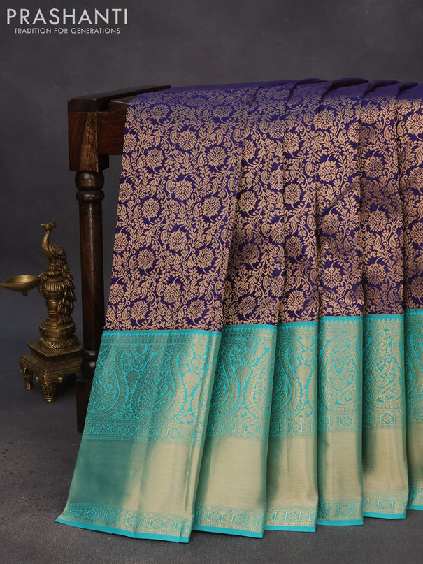 Pure kanchipuram silk saree navy blue and teal green shade with allover zari woven brocade weaves and long rich zari woven korvai border