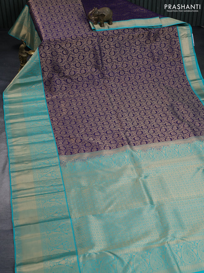 Pure kanchipuram silk saree navy blue and teal green shade with allover zari woven brocade weaves and long rich zari woven korvai border