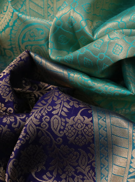 Pure kanchipuram silk saree navy blue and teal green shade with allover zari woven brocade weaves and long rich zari woven korvai border