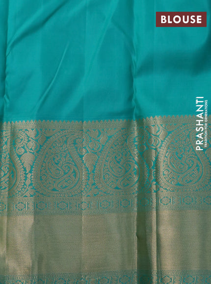 Pure kanchipuram silk saree navy blue and teal green shade with allover zari woven brocade weaves and long rich zari woven korvai border