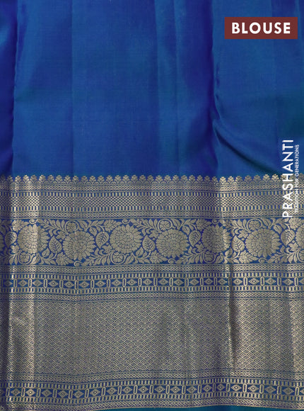 Pure kanchipuram silk saree dual shade of peacock blue with allover zari woven brocade weaves and long floral zari woven border