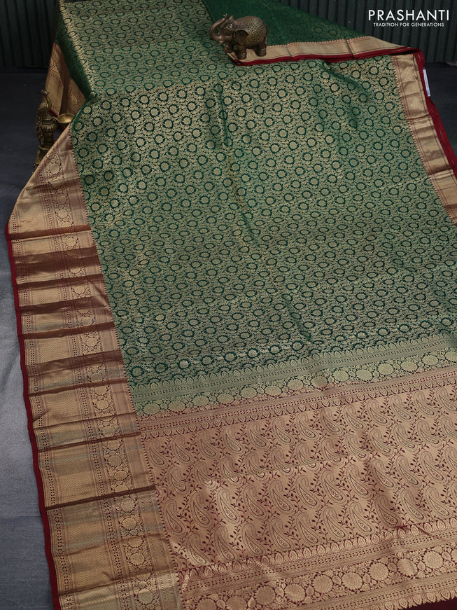 Pure kanchipuram silk saree green and maroon with allover zari woven brocade weaves and long floral zari woven border