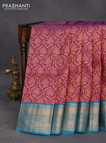 Pure kanchipuram silk saree dark magenta pink and teal blue with allover zari woven floral brocade weaves and zari woven korvai border