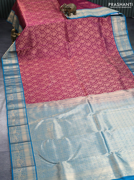 Pure kanchipuram silk saree dark magenta pink and teal blue with allover zari woven floral brocade weaves and zari woven korvai border