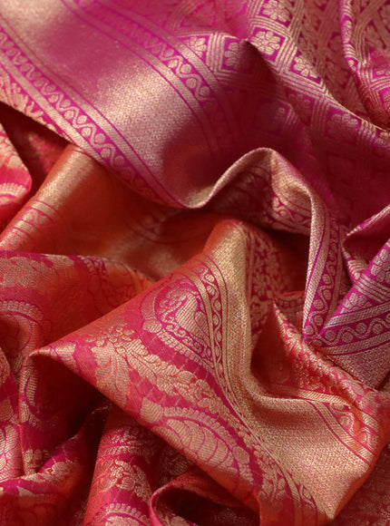 Pure kanchipuram silk saree dual shade of pinkish orange and pink with allover zari woven brocade weaves and zari woven border