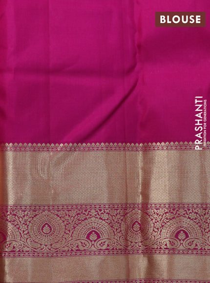 Pure kanchipuram silk saree dual shade of pinkish orange and pink with allover zari woven brocade weaves and zari woven border