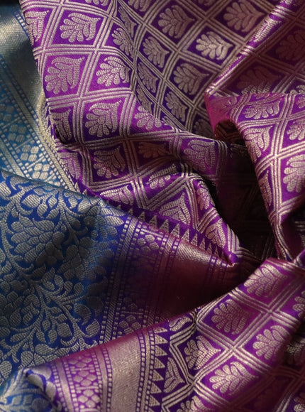 Pure kanchipuram silk saree dual shade of peacock blue and purple with allover zari woven floral brocade weaves and floral zari woven border