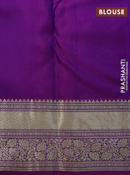 Pure kanchipuram silk saree dual shade of peacock blue and purple with allover zari woven floral brocade weaves and floral zari woven border