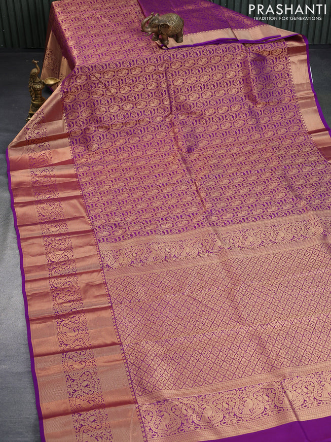 Pure kanchipuram silk saree purple with allover zari woven brocade weaves and long zari woven border