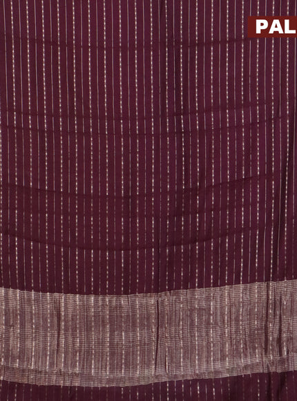 Assam silk saree wine shade with allover zari woven stripes pattern and zari woven border