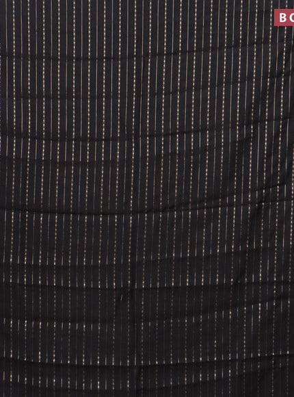 Assam silk saree black with allover zari woven stripes pattern and zari woven border