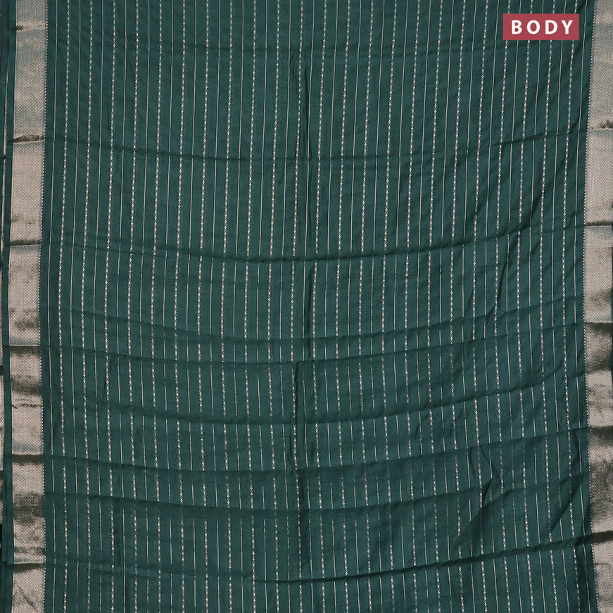 Assam silk saree green with allover zari woven stripes pattern and zari woven border