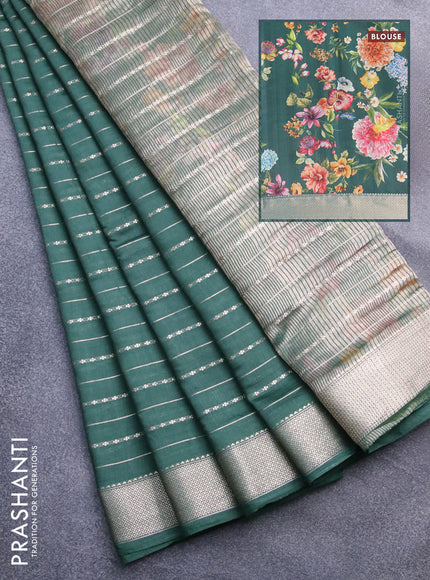 Assam silk saree green with allover zari woven stripes pattern and zari woven border