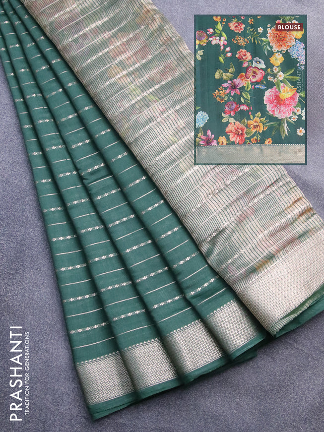 Assam silk saree green with allover zari woven stripes pattern and zari woven border