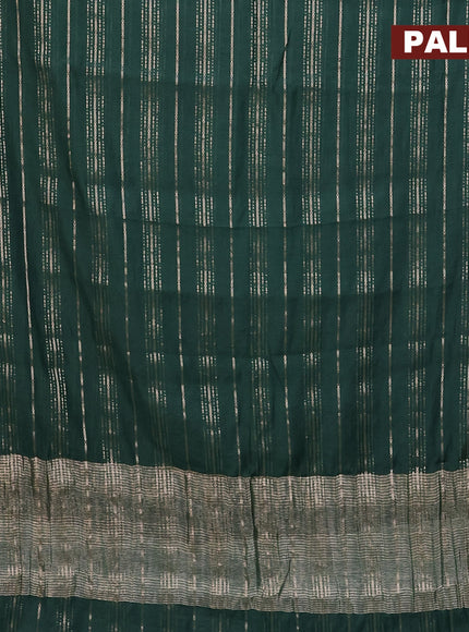 Assam silk saree green with allover zari woven stripes pattern and zari woven border