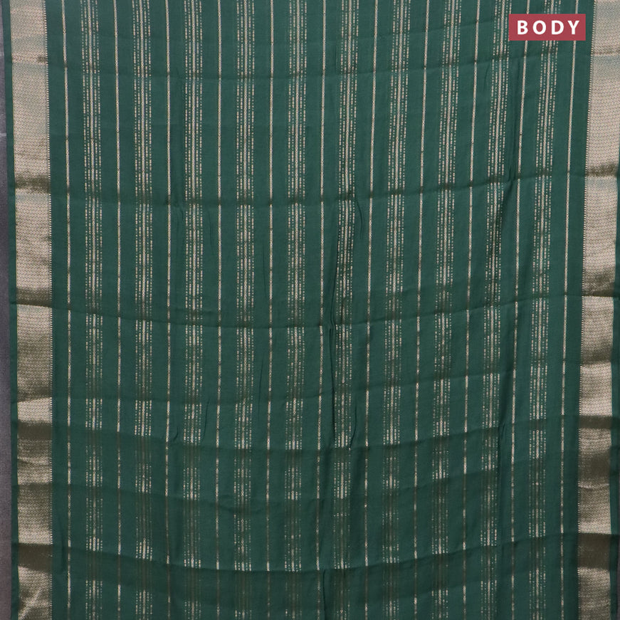 Assam silk saree green with allover zari woven stripes pattern and zari woven border