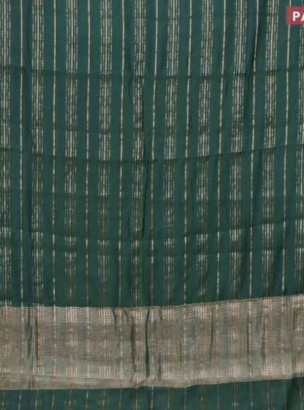 Assam silk saree green with allover zari woven stripes pattern and zari woven border