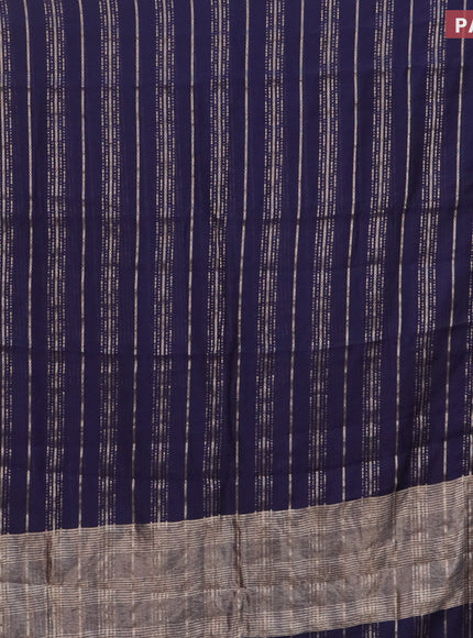 Assam silk saree blue with allover zari woven stripes pattern and zari woven border