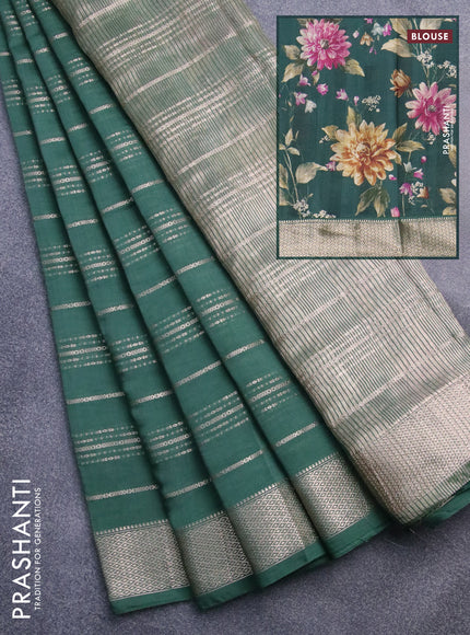 Assam silk saree green with allover zari woven stripes pattern and zari woven border