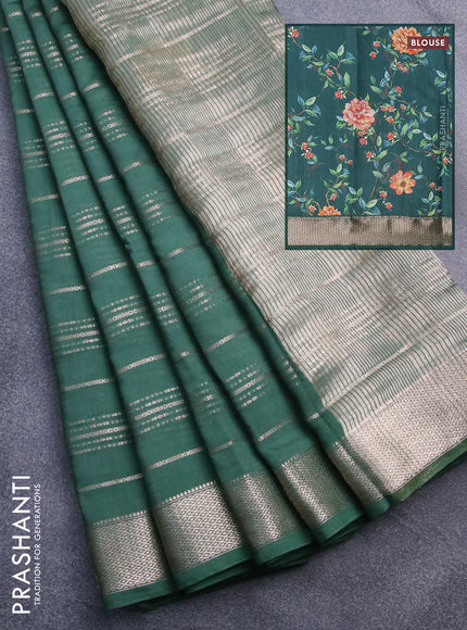 Assam silk saree green with allover zari woven stripes pattern and zari woven border