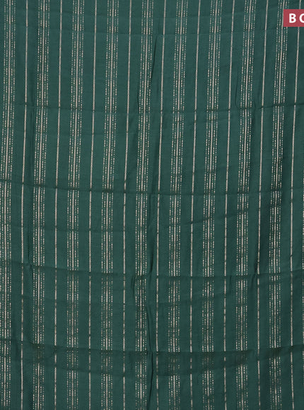 Assam silk saree green with allover zari woven stripes pattern and zari woven border